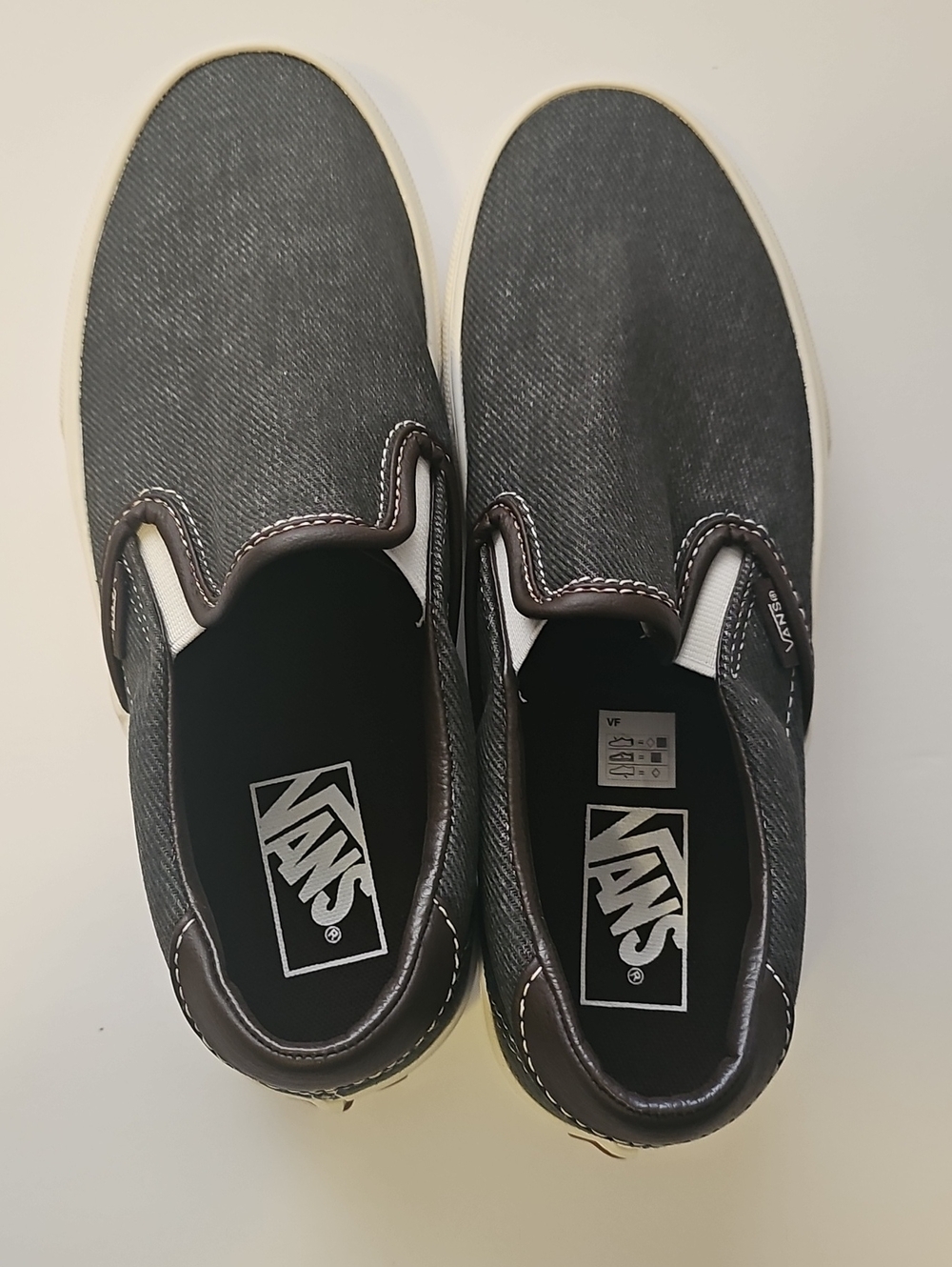 Vans Kids Slip-On Sneakers in Charcoal and White